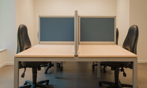 Clean and organized modern desk with ergonomic chair